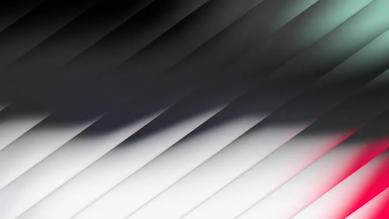 Oblique Silver: Charcoal and silver through diagonal glass, with mint and red fringes.