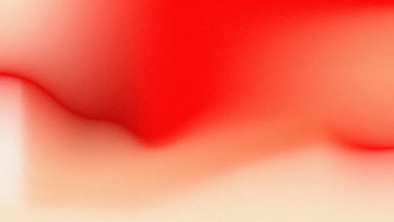 Vermilion: A vermilion sweep dissolving into warm peach, with tactile grain.