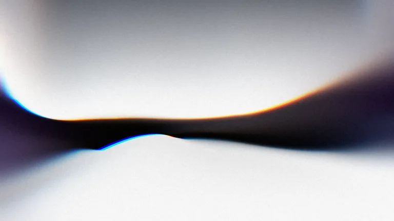 Silver Tide: Silver folds around an ink-blue seam, edged with spectral light.